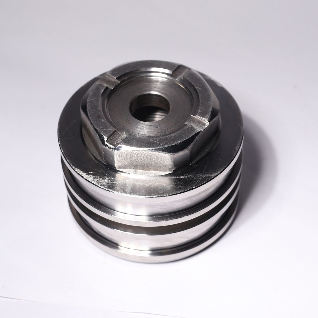 Slotted piston