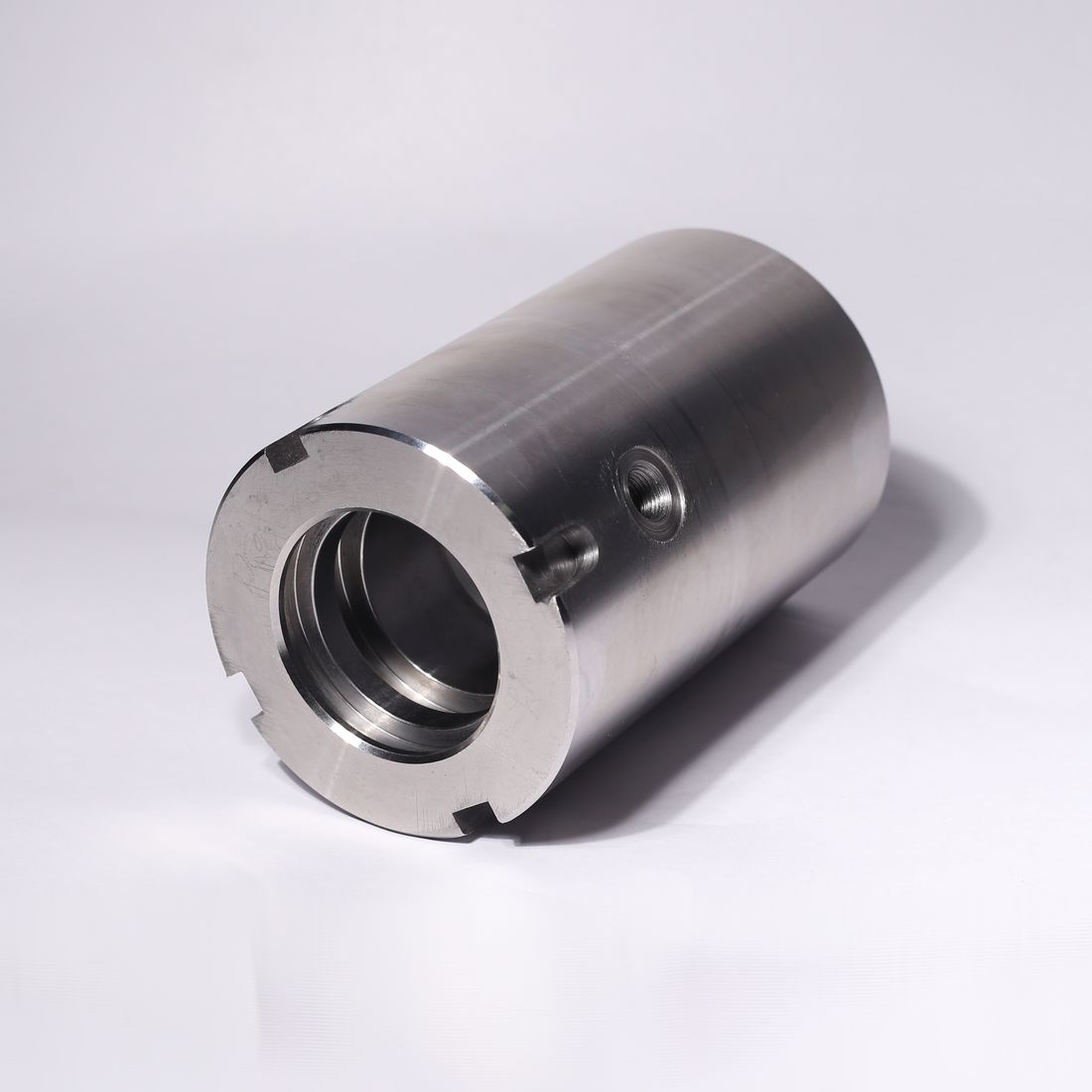 Ported sleeve with slot