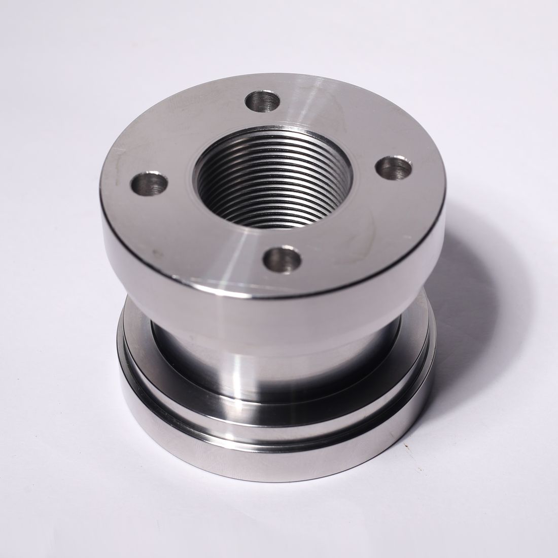 Flanged end cap, threaded bore